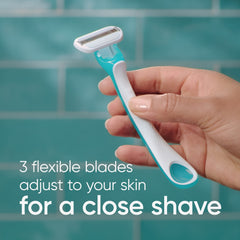 Gillette Venus Tropical pivot head reaching curves during shaving.