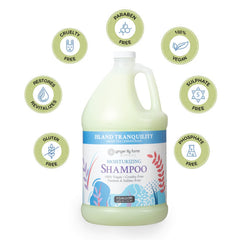 Pouring Island Tranquility shampoo from a gallon bottle.