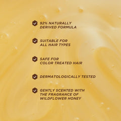Gisou Honey Gloss Ceramide Therapy Shampoo bottle pouring action.