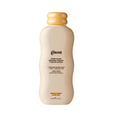Gisou Honey Gloss Ceramide Therapy Shampoo bottle with shimmering shine.