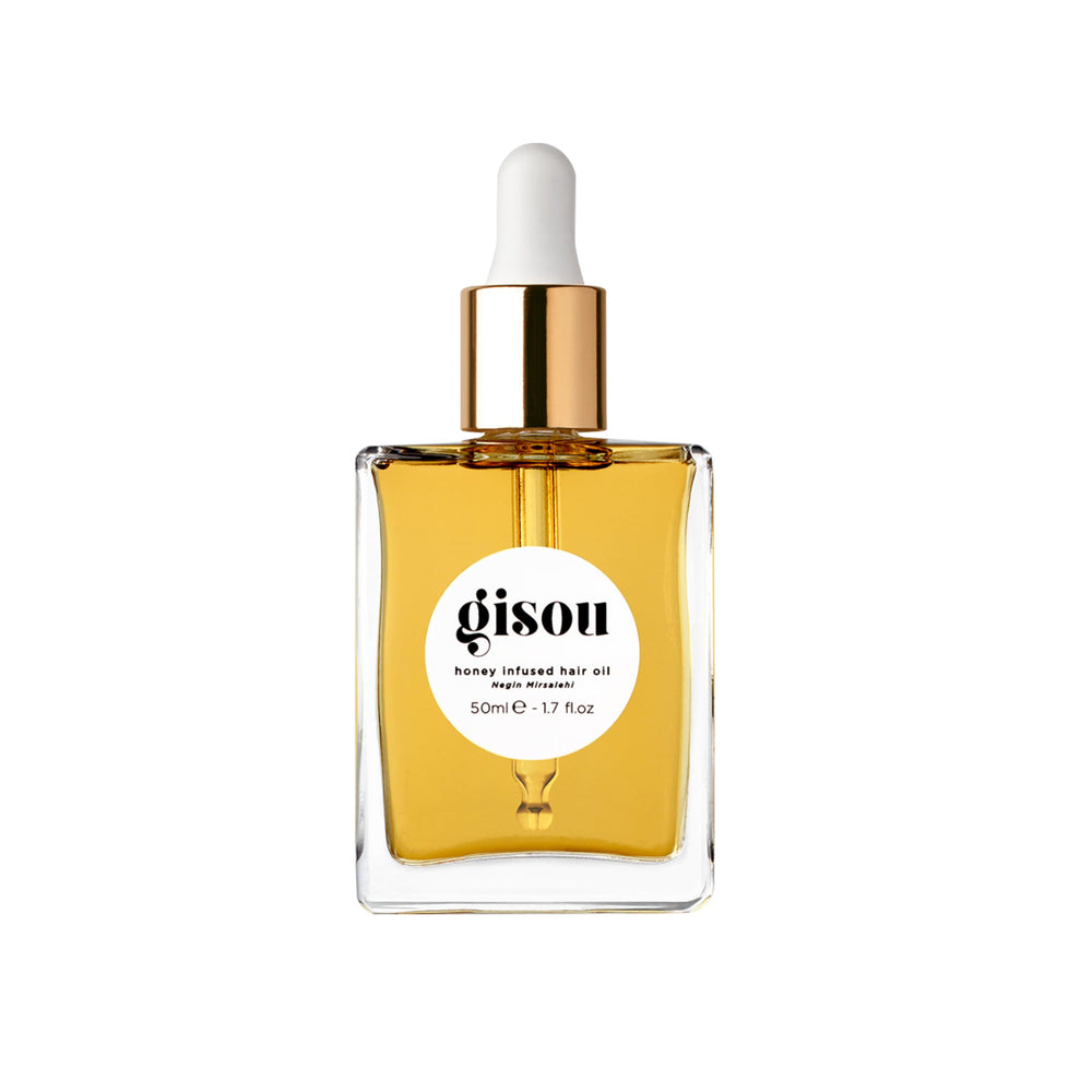 Gisou Honey Infused Hair Oil bottle shot showing hydrating shine for all hair types.