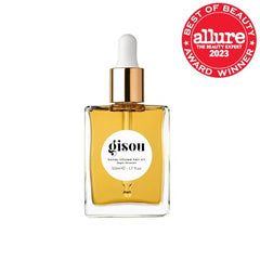 Gisou Honey Infused Hair Oil drop application demonstrating fast absorption and frizz control.