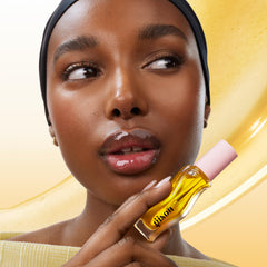 Gisou Lip Oil texture demonstrates sheer glide-on application.
