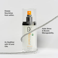 GK Hair vegan leave-in conditioner spray applying instant moisture to hair