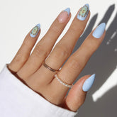 Glamnetic Angel in Blue powder-almond nails for elegant everyday wear.