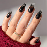 Uñas Glamnetic Dementor con gradiente negro en forma almendra media para look nocturno y duradero