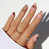 Glamnetic Queen of Hearts nails kit with medium coffin shape for at-home salon-style manicure