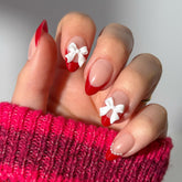 Glamnetic Ruby Ribbons uñas almendra con frances rojo, acabado de salón en casa.