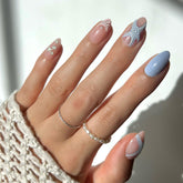 Glamnetic Salty Waves: uñas cortas almendra con arte 3D de conchas para un estilo marinero duradero