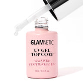 Glamnetic UV Gel Clear Top Coat en botella, listo para aplicación y acabado brillante.