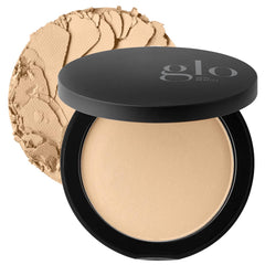 Glo Skin Beauty pressed base compact Golden Medium with a natural second-skin finish.