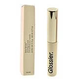 Glossier Boy Brow Blond gel-pomade in jar with brush for natural-looking hold.