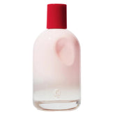 Glossier You bottle closeup highlighting the warm ambrox base for everyday balance