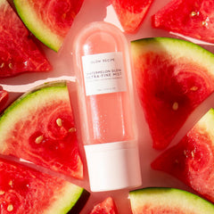 Closeup of Glow Recipe Watermelon Glow Facial Spray mist delivering refreshing hydration.