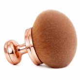 GOERTI extra-large self-tanner brush head for smooth, even body blends.