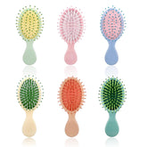 Goiio mini wet hair brush set in bright colors for gentle detangling on the go.