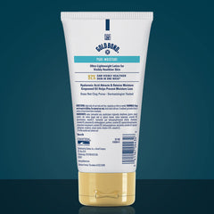 Gold Bond Pure Moisture Lotion label highlights hyaluronic acid and grapeseed oil