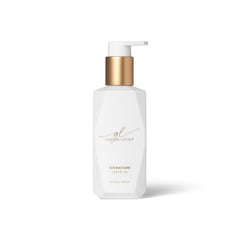 Goldie Locks Signature Leave-In Conditioner bottle pour for quick detangling and hydration.