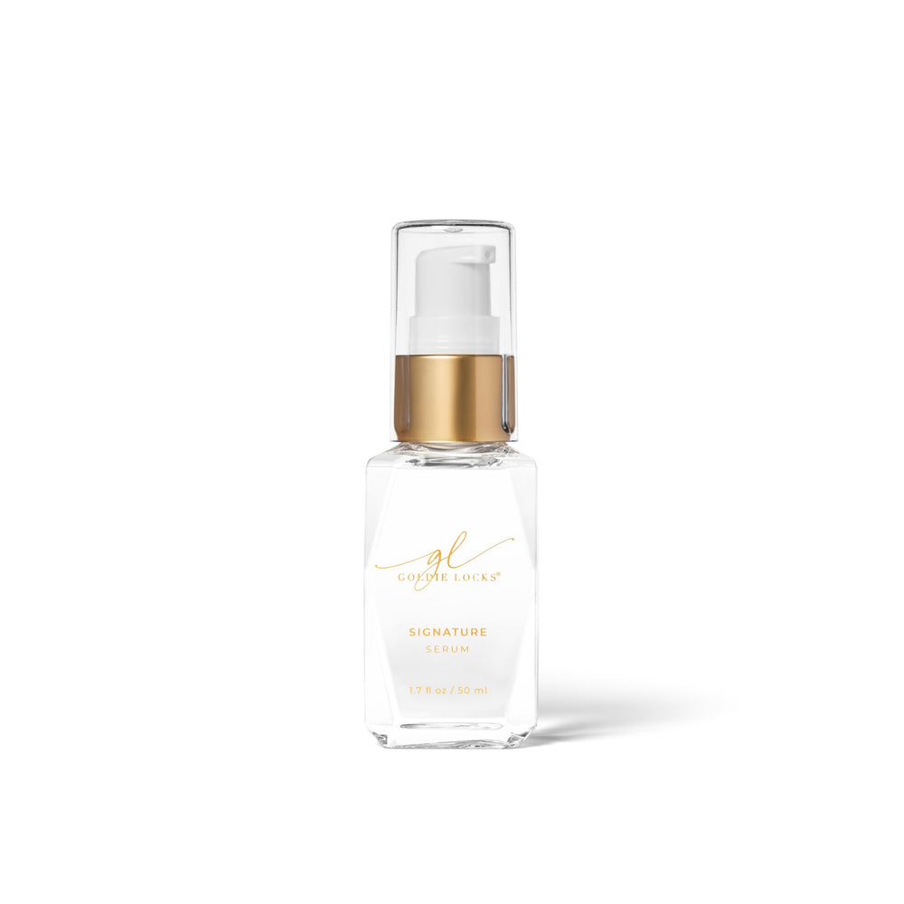 Goldie Locks Signature Serum bottle close-up showing frizz-control for sleek shine