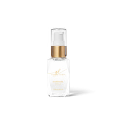 Goldie Locks Signature Serum bottle close-up showing frizz-control for sleek shine