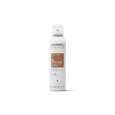 Goldwell StyleSign Dry Spray Wax bottle in use delivering quick application for sleek texture