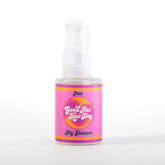 Good Ass Hair Day dark dry shampoo powder refreshes oily roots with no white cast.