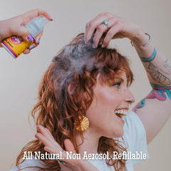 Good Ass Hair Day dry shampoo powder blends with dark hair for a natural finish.