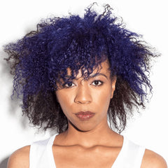 Good Dye Young applying purple hair color demonstrates easy, even coverage