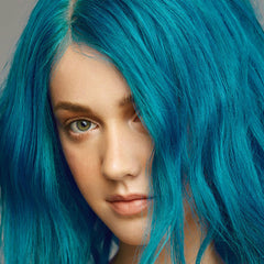 Good Dye Young teal blue swirl demonstrates vibrant, easy-to-apply semi-permanent color.
