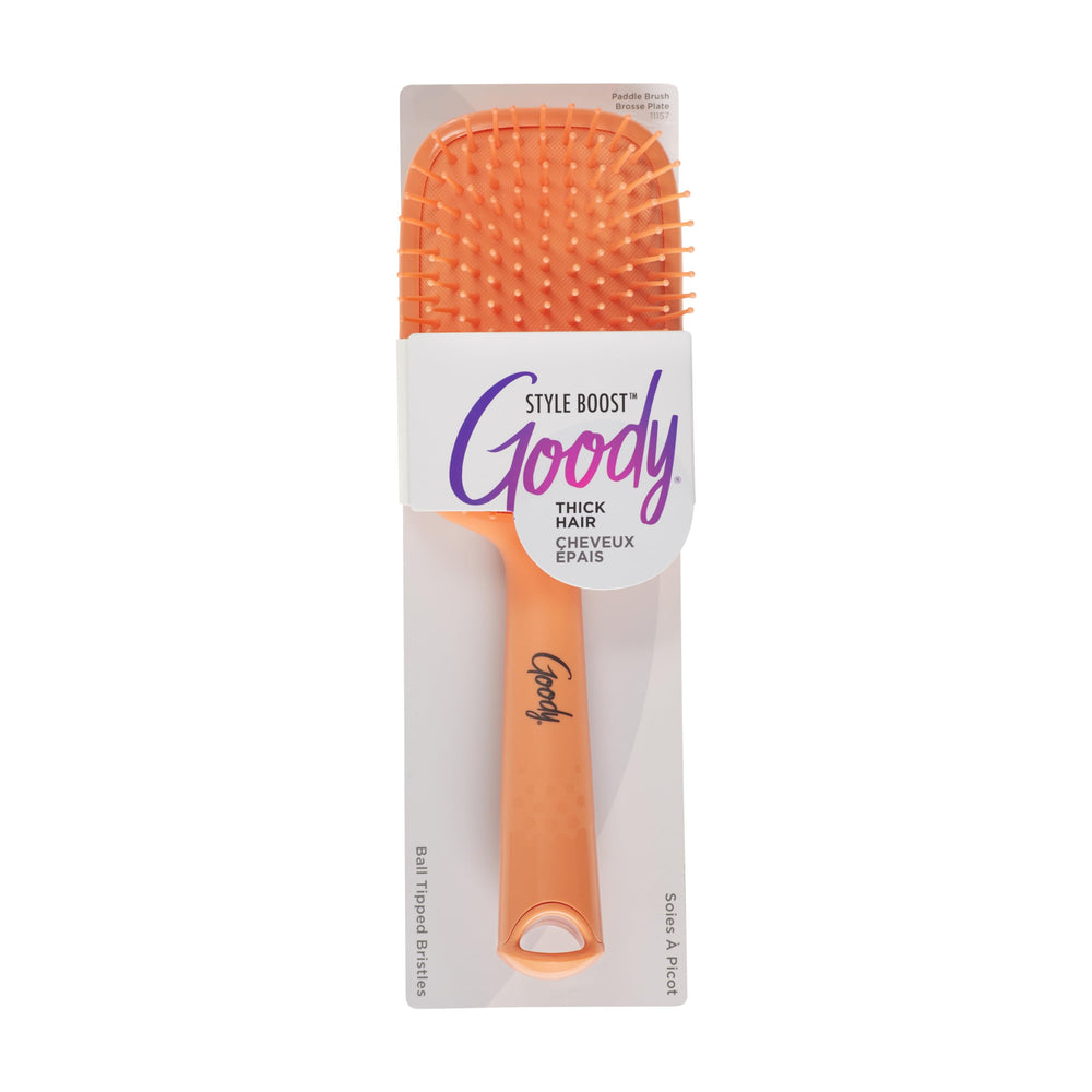 Goody Style Boost paddle brush in coral gently detangles knots with flexible bristles.