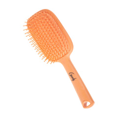 Goody paddle brush wide head easing knot removal on thick tresses.