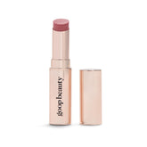 Goop Beauty Tinted Lip Balm packaging close-up, cruelty-free formula.