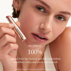 Goop Lip Balm tube close-up with sleek, travel-friendly packaging.