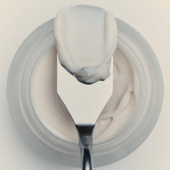 goop Youth-Boost cream application on face shows smooth, radiant skin readiness.