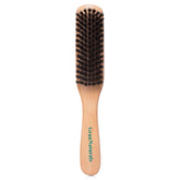 GranNaturals boar bristle slick-back brush for a polished, frizz-free look