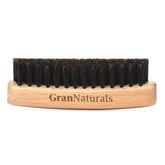 GranNaturals boar bristle slick-back hairbrush palm size for smooth, frizz-free styling.