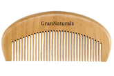 GranNaturals wooden comb close-up, teeth for gentle detangling and reduced frizz.
