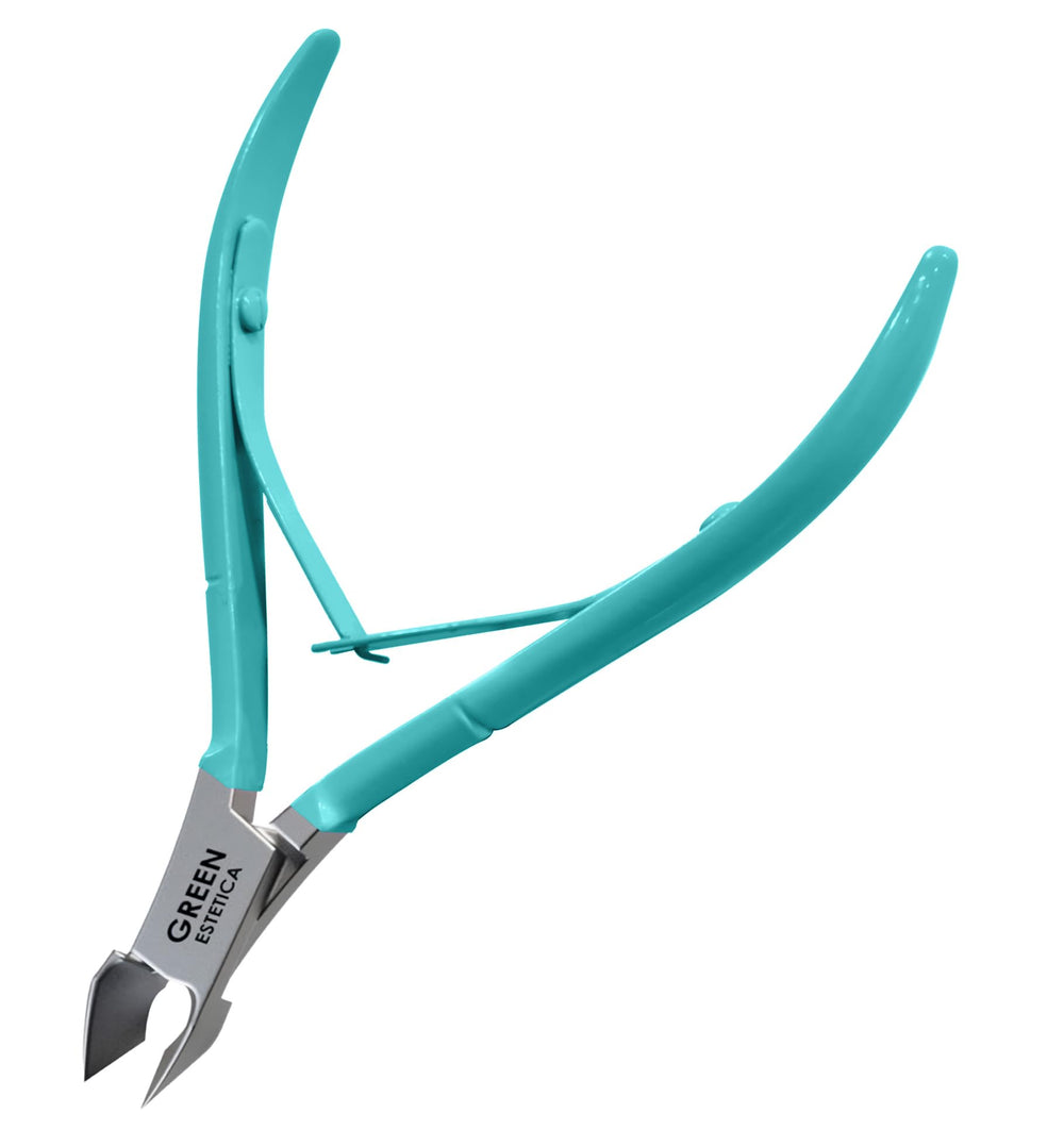 Green Estetica cuticle trimmer handle closeup for precise cuticle care.