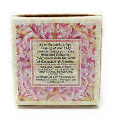 Applying Greenwich Bay Dusting Powder for soft, refreshed skin.