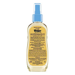 Grisi Ricitos Oro Cologne spray application demonstrates even distribution