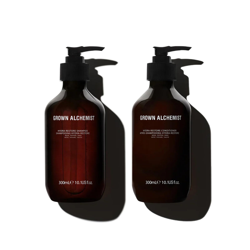 Grown Alchemist Hydra-Restore Shampoo bottle offers a lightweight cleanse for nourished hair.
