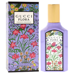 Gucci Flora Gorgeous Magnolia cap detail reinforces premium packaging.