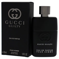 Gucci Guilty Pour Homme base notes patchouli cedarwood amber image highlights lasting warmth