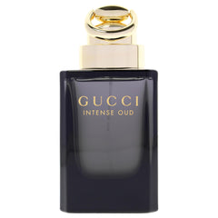 Gucci Intense Oud cap close-up showing premium details and branding.