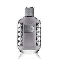 Guess Dare for Men EDT spray, easy-to-hold bottle for quick refreshes.