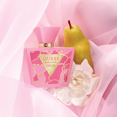 GUESS Seductive Dream bottle top view, premium fragrance in a sleek silhouette.