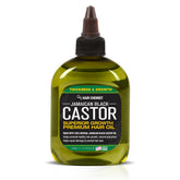 Hair Chemist Jamaican Black Castor Oil bottle pouring for nourishing scalp and thicker hair