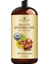 Handcraft Blends Jojoba Oil bottle label shows organic purity for nourished skin.