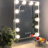 Hansong vanity mirror with lights, 12 dimmable bulbs illuminate makeup application.