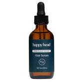 Happy Head Hair Regrowth Serum bottle showcases a lightweight formula for fuller-looking hair.
